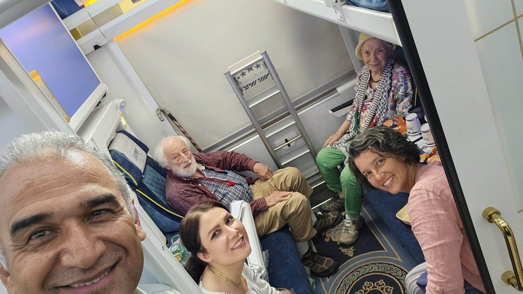 The delegation together on a flight to Iran